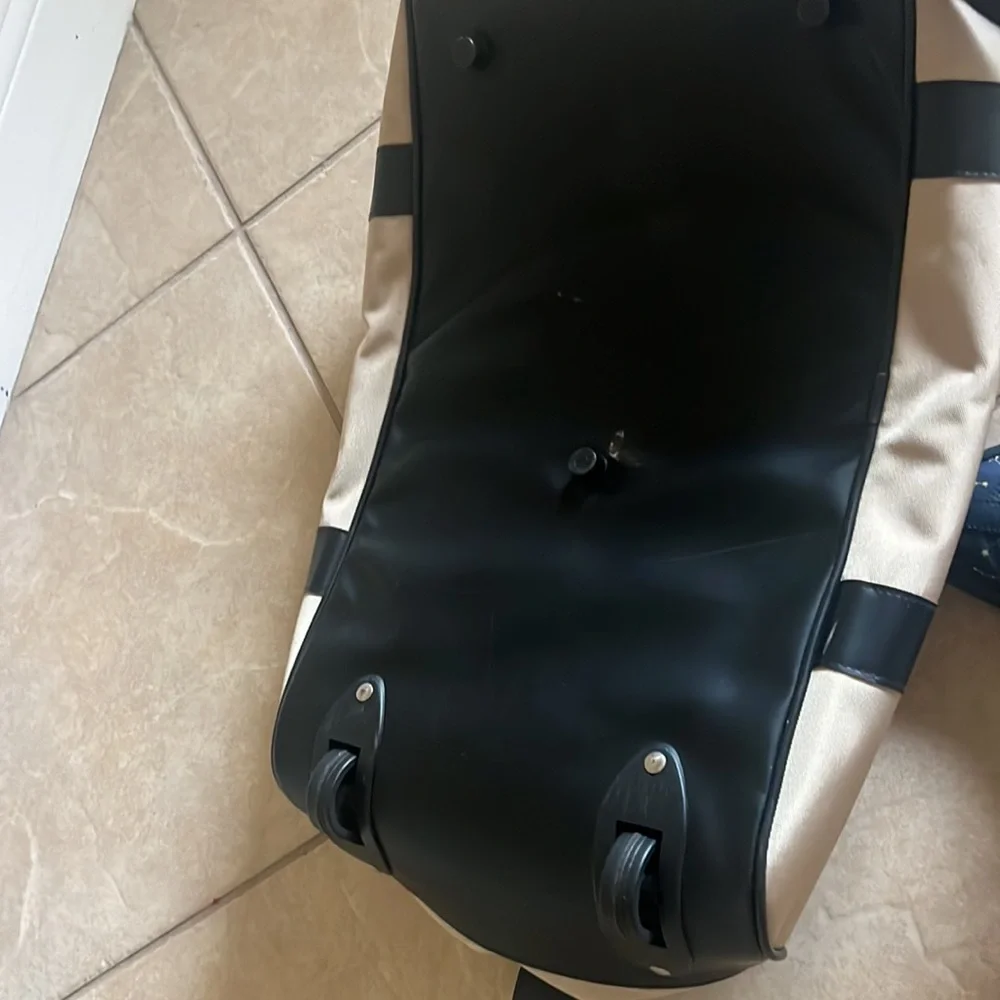 Calvin Klein roller luggage perfect for a carry-on use have some stain